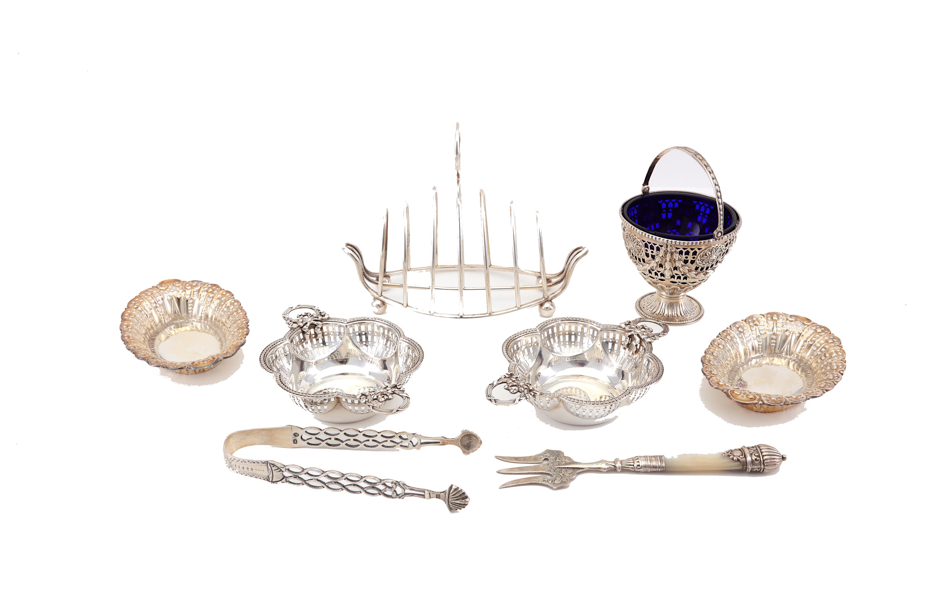 A mixed group of antique sterling silver, including a sugar basket, Sheffield 1898 by Martin, Hall &