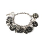 Louis Vuitton Black and White Breloques bracelet, silver tone chain hung with black enamel 'Trunks