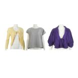 Two Pleats Please Tops, to include a silver t-shirt and a yellow cardigan, together with a purple