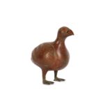 * AN INCISED BRONZE FIGURE OF A PARTRIDGE