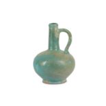 A TURQUOISE-GLAZED POTTERY WATER JUG Ray, Iran, 11