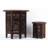 An Anglo-Indian carved wooden occasional table, the octagonal top carved in relief with fruiting