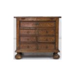 A small 18th Century Dutch walnut and floral marquetry inlaid chest, formerly a Bachelors chest, the