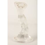 A mid 20th Century moulded and frosted glass figure of a nude dancer, 'Danseuse Bras Leves', to a