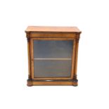 A small Victorian boxwood strung figured walnut pier cabinet, the glazed door flanked by turned
