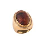 A fire agate and diamond ring