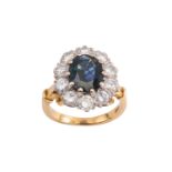 A sapphire and diamond cluster ring