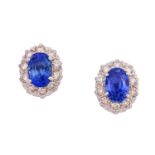 A pair of sapphire and diamond cluster earrings