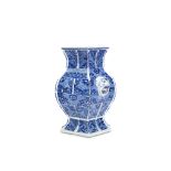 A CHINESE BLUE AND WHITE VASE, FANGHU. Kangxi. Of square section, the spreading foot rising to a