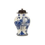 A CHINESE BLUE AND WHITE ‘SEAMSTRESSES’ VASE. Kangxi. Of baluster form, finely painted in underglaze