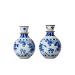 A PAIR OF CHINESE BLUE AND WHITE HOOKAH BASES. Kangxi. The globular body rising from a recessed base