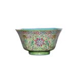 A CHINESE FAMILLE ROSE LIME-GREEN GROUND BOWL. Qin