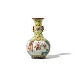 A CHINESE FAMILLE ROSE ‘BOYS AT PLAY’ BOTTLE VASE.