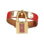 Hermes Red Lizard Skin Kelly Watch, gold tone hardware and buckle strap, 19cm long, 2cm high