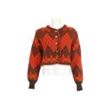 Yves Saint Laurent Rive Gauche Knitted Cardigan, 1990s, in shades of orange and brown wool with