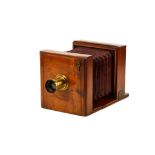 An Unmarked Mahogany Wet Plate Tailboard Camera,