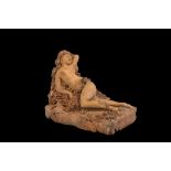 A 19TH CENTURY TERRACOTTA BOZZETTO OF VENUS RECLINING DATED 1877 the nude goddess reclining on a bed