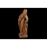 A LATE 15TH CENTURY GERMAN CARVED WALNUT FIGURE OF SAINT ANTHONY THE HERMIT the standing figure with