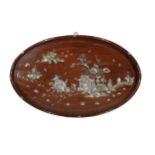 An oval Chinese hardwood and abalone inlaid tray