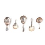 Four Georgian silver caddy spoons and another