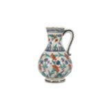 AN IZNIK-STYLE POTTERY JUG Possibly France