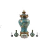 A Chinese cloisonne table lamp, with cloisonne vases and an inkwell