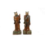 A pair of Chinese Ming Dynasty Sancai pottery ridge tile figures