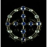 A sapphire and diamond brooch,