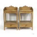 A pair of pine bedside tables, the three-quarter galleried tops above a lower tier with drawer,