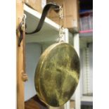 A small brass gong with snake support, the gong 28cm diameter/Provenance: The Down House,