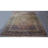 A large Kashan carpet, with abrashed field,