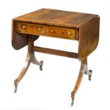 A Regency mahogany and satinwood crossbanded sofa table, of narrow proportions,