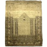 A Tabriz silk prayer rug, Northwest Persia, circa 1900, the olive green mihrab with a hanging lamp,