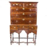 An early 18th Century oak chest on stand,