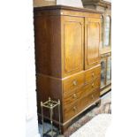 A George III mahogany linen press adapted for hanging,