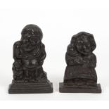 A pair of cast iron Punch and Judy door stops,