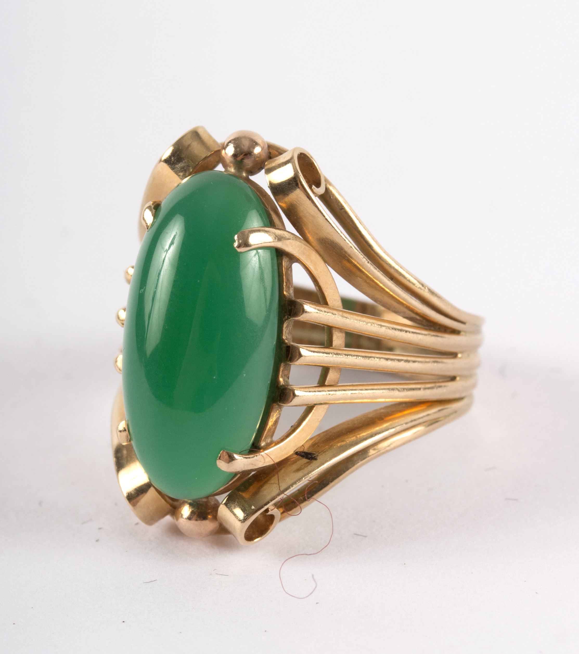 A chrysoprase ring, the oval stone in a stylised 14ct yellow gold setting, - Image 3 of 4