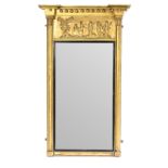 A Regency gilt framed pier glass with ball studded cornice,