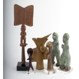 A small group of tribal items, including a ceremonial axe, 38cm high,