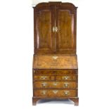 A Queen Anne and later walnut bureau bookcase,