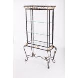 A metal framed display unit, fitted three glass open shelves,