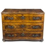 A late 18th Century Austrian walnut commode, fitted three drawers with waved front,