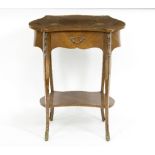 A French kidney shaped inlaid table with single drawer on cabriole legs, gilt metal mounts,