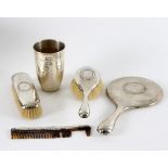A Danish silver beaker, assay master Christian F Heise, with hammered finish, dated to collar,