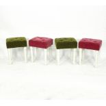 A set of four rectangular stools, with button upholstered seats on turned legs,