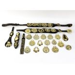 Two leather straps of five horse brasses,