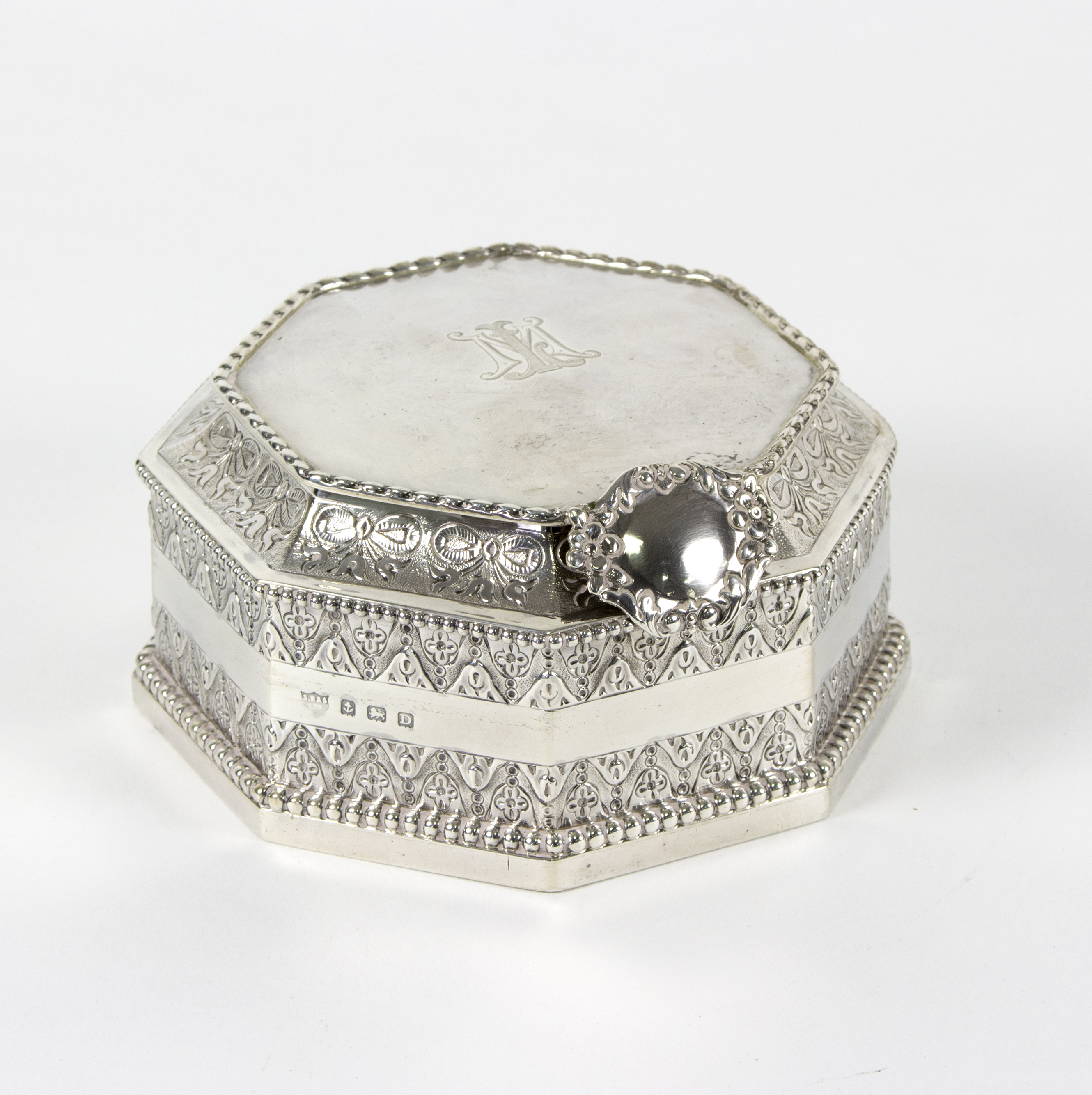 A silver cased inkwell, S Blanckensee & Son Ltd, Birmingham 1928, of octagonal shape,