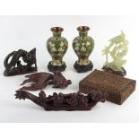 A small group of Oriental items to include a pair of cloisonné vases, jadeite carvings etc.