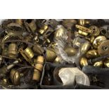 A quantity of various brass and metal fittings to include door knobs,