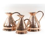 Two West Country copper one gallon measures,